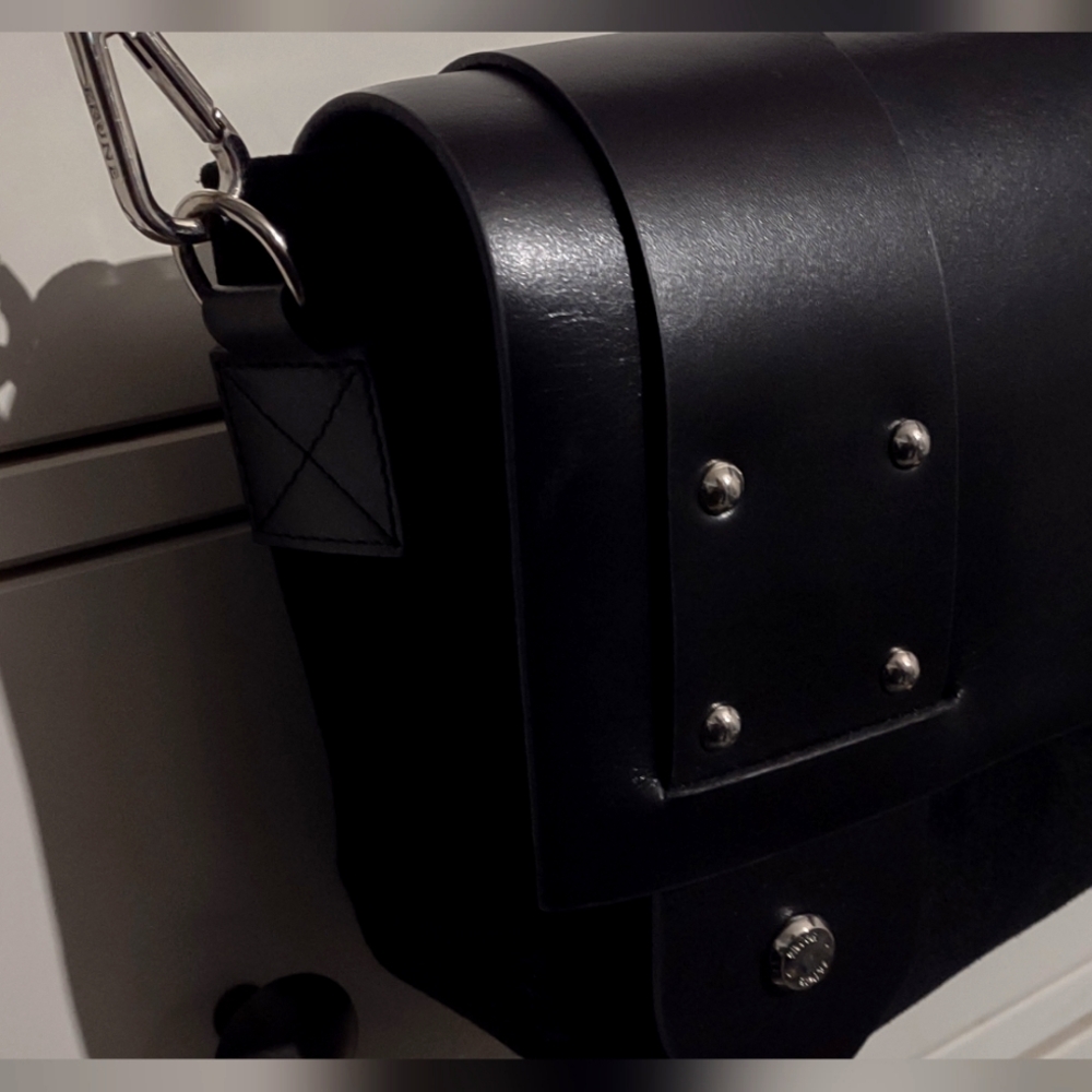 PRUNE . Black suede and bovine leather dotted snap front zipper prune purse.